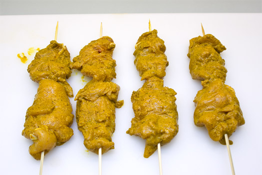 the raw, marinaded chicken kebabs
