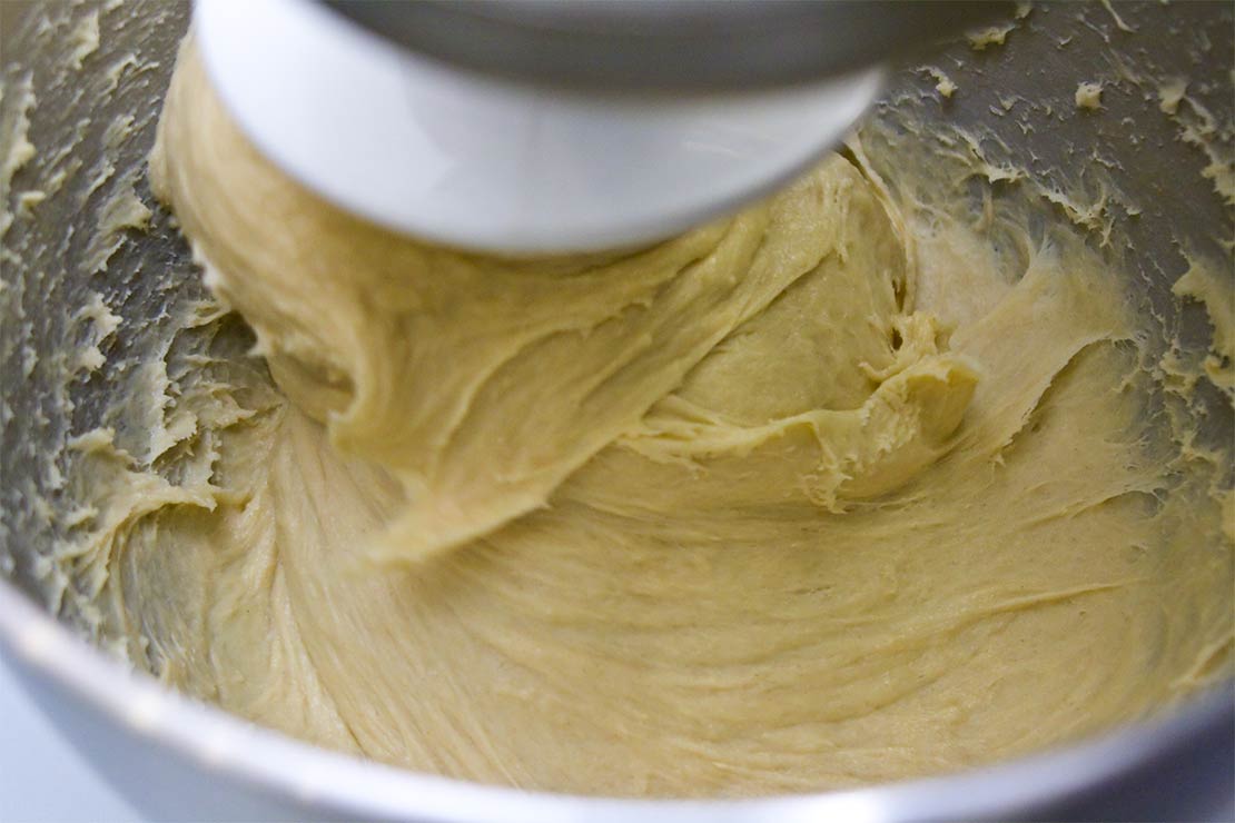 kneading the brioche dough with a machine