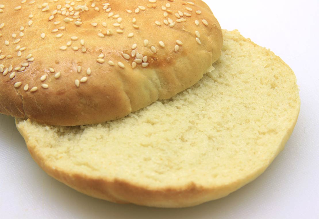 a finished burger bun, cut in half