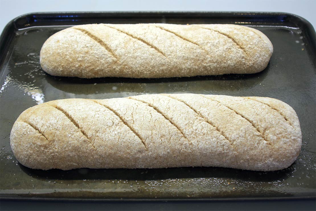the wholemeal loaf on a tray, ready for the second rise