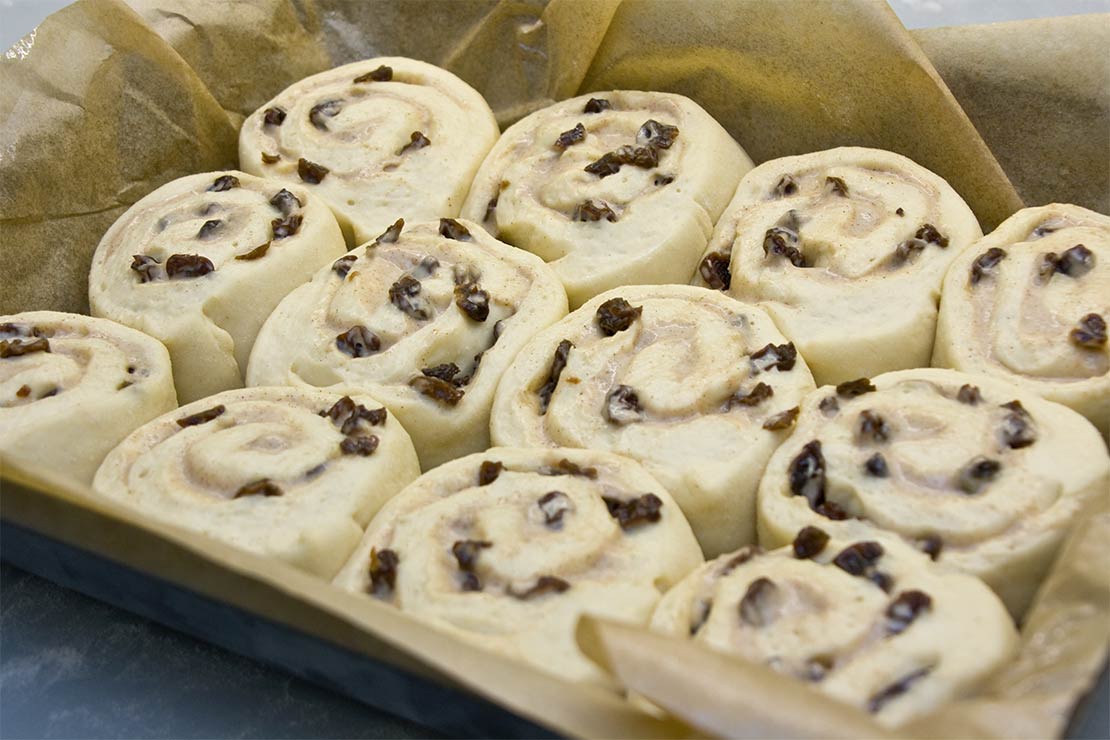 the raw chelsea buns after the final rising