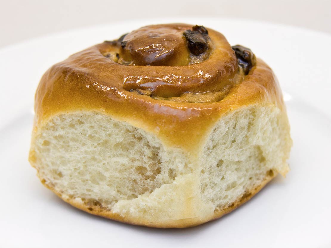 a finished chelsea bun on a plate
