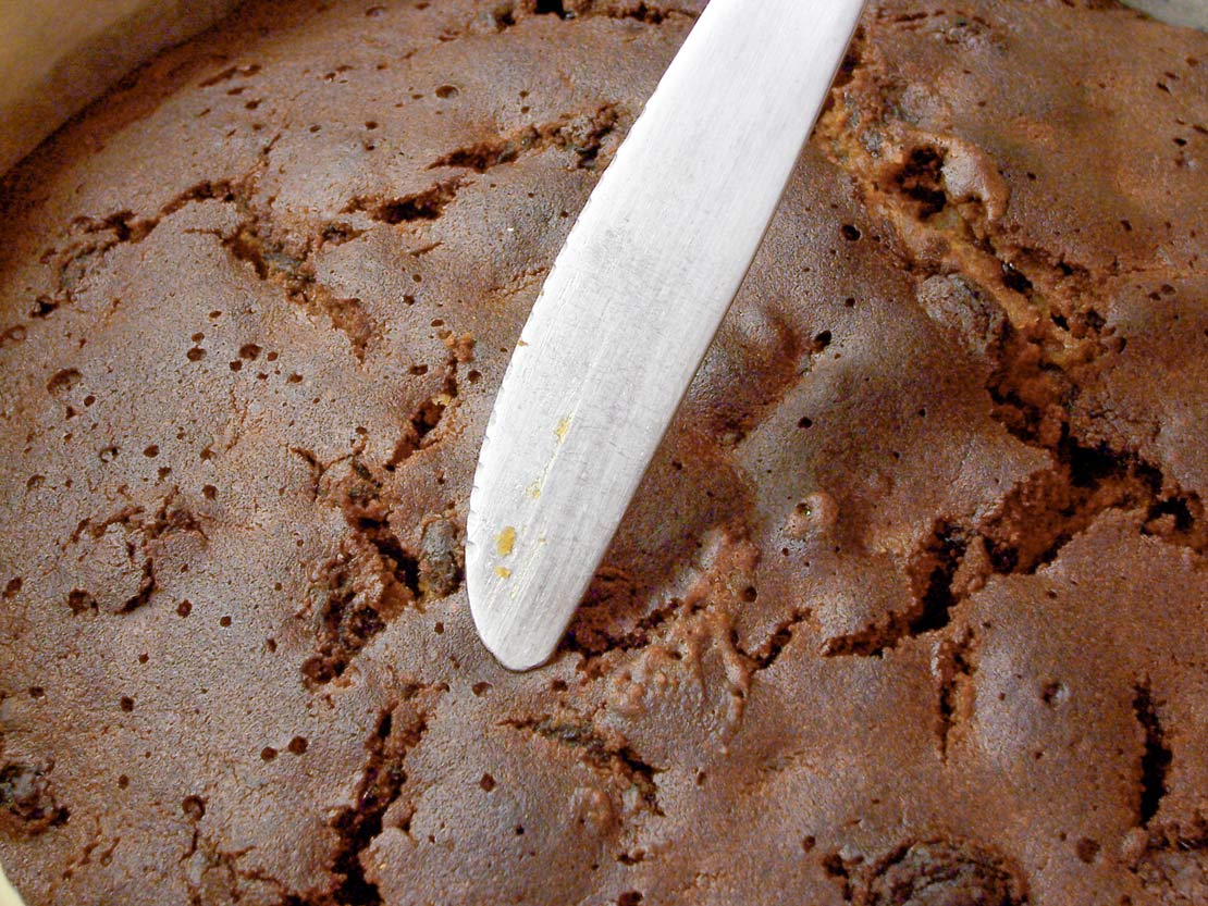 Testing the cake when it is cooked