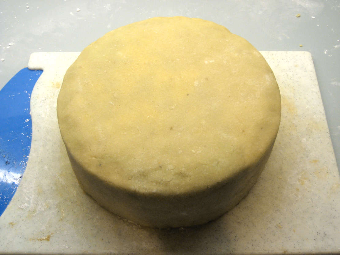 Smoothing and trimming the marzipan.