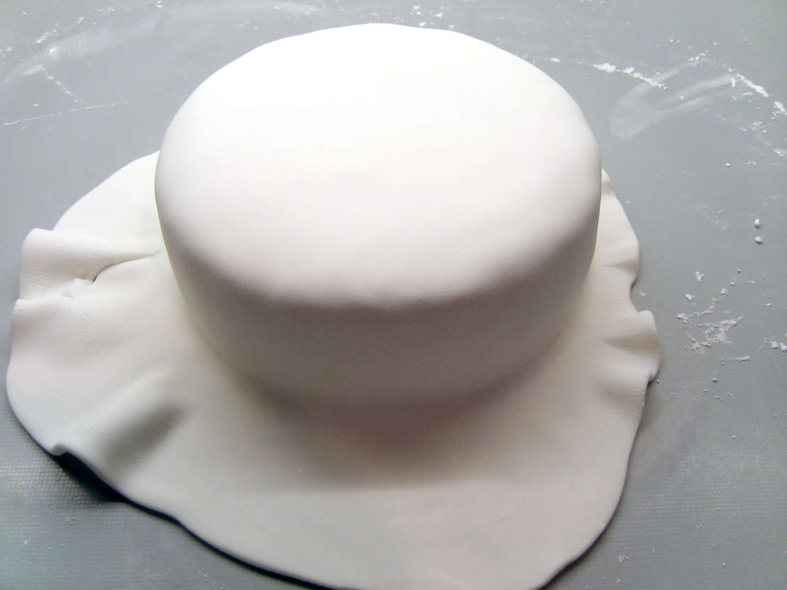Smoothing down the icing