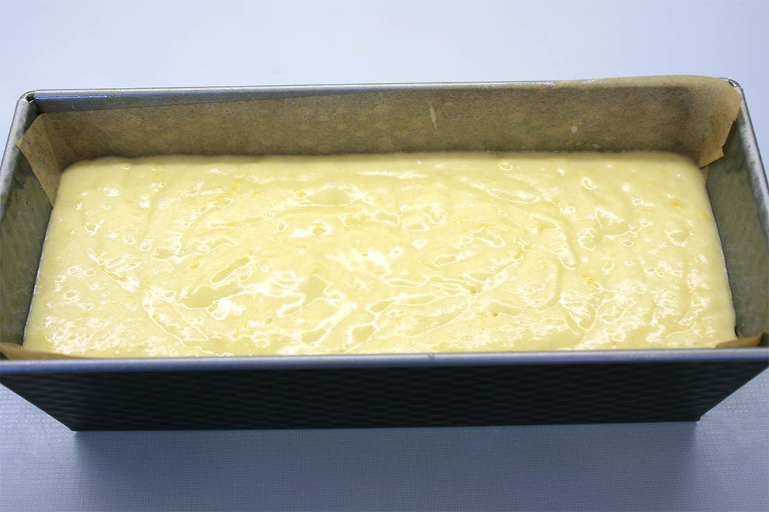 the cake batter in the loaf tin