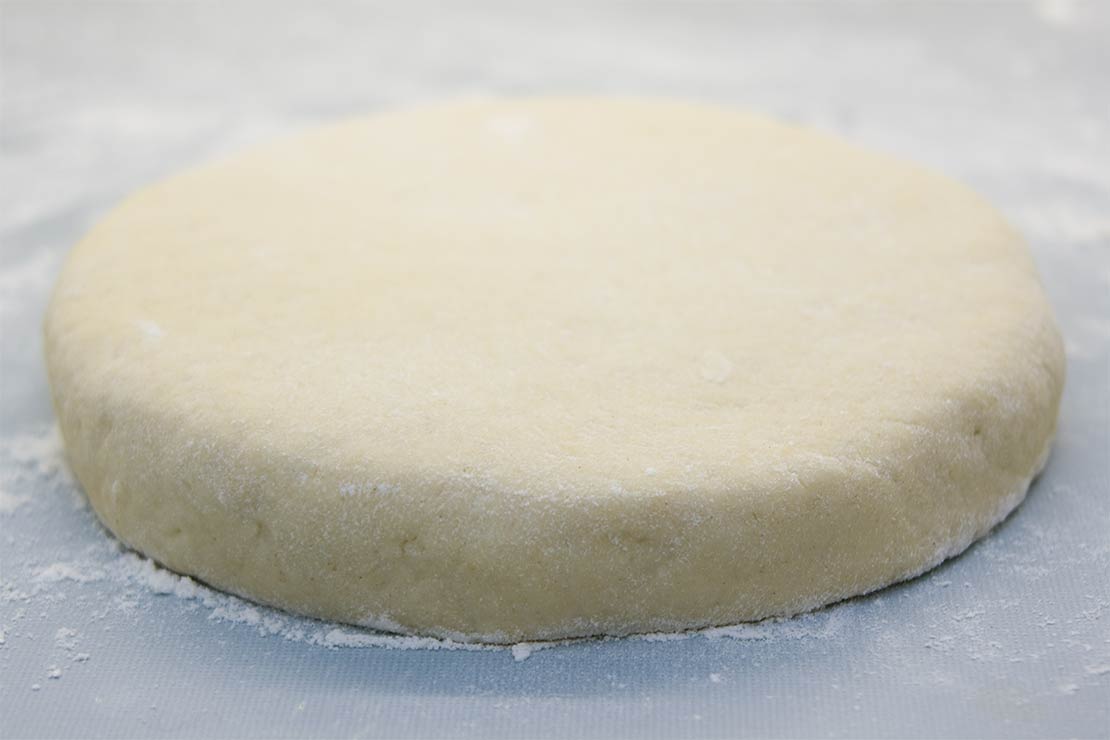 the rolled out scone dough