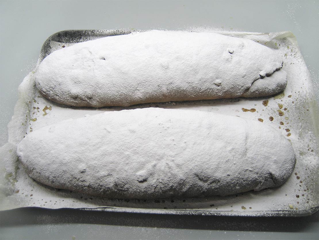 the stollen dredged with icing sugar