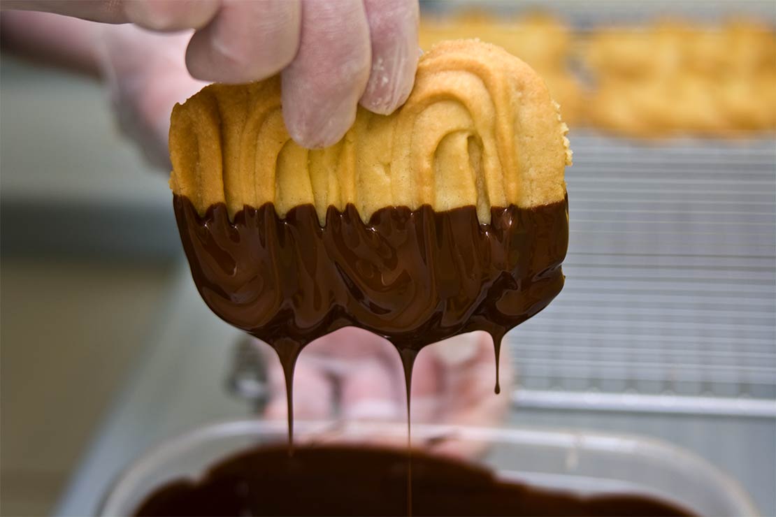 dipping them in chocolate