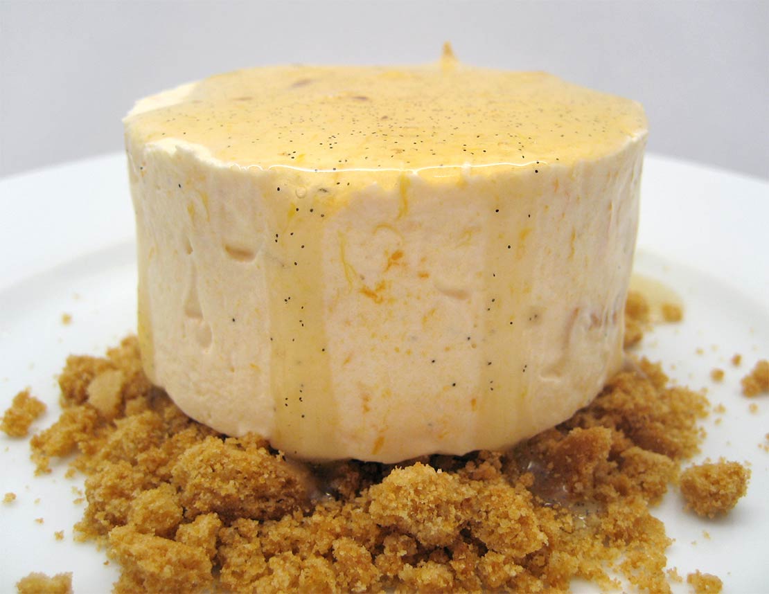 the finished apricot parfait on a abed of crushed ginger biscuit
