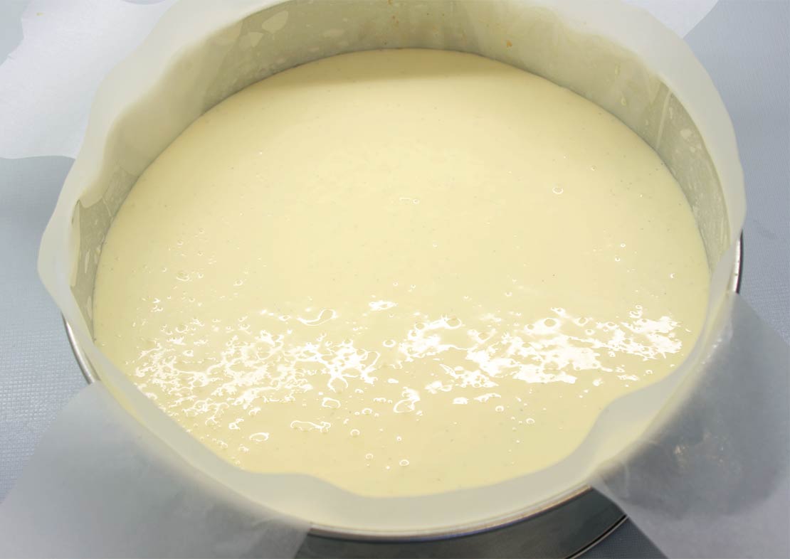the cream cheese filling in the lined tin