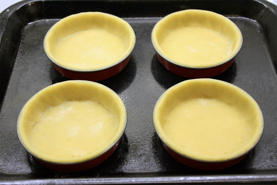 the pastry lined tart tins