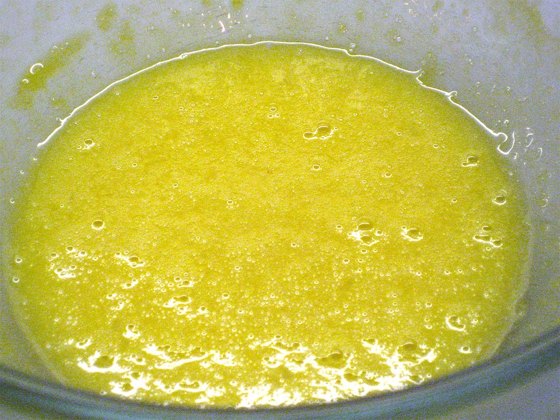 mixing the sugar and egg yolks