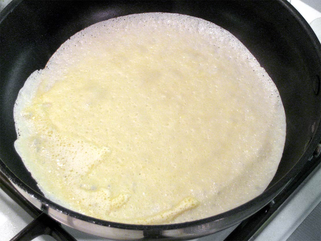cooking the first side of the pancake