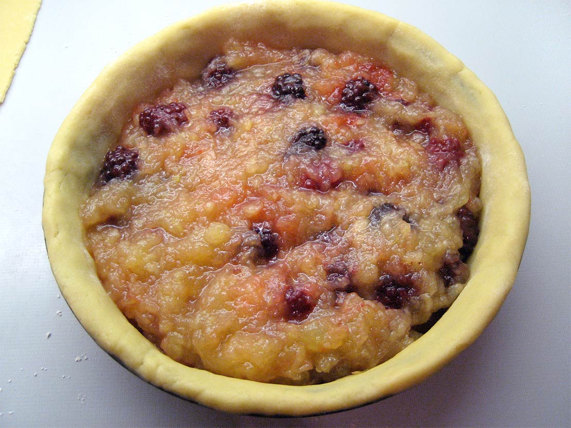 filling the pie dish