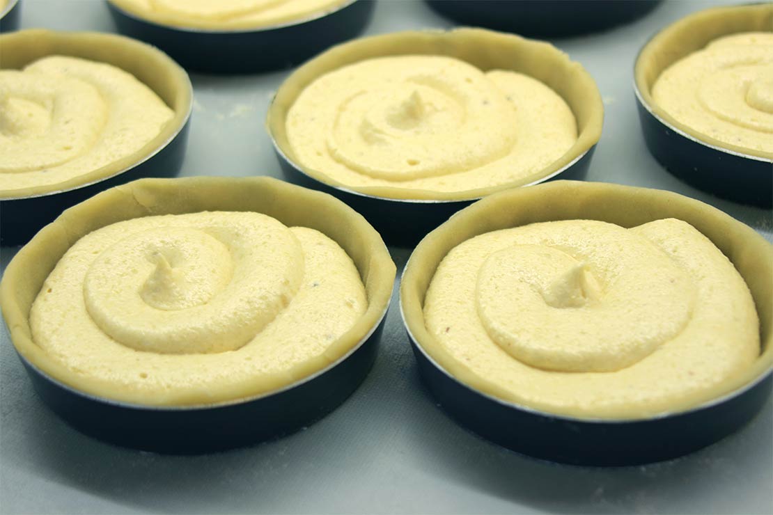 the frangipane piped into the pastry case