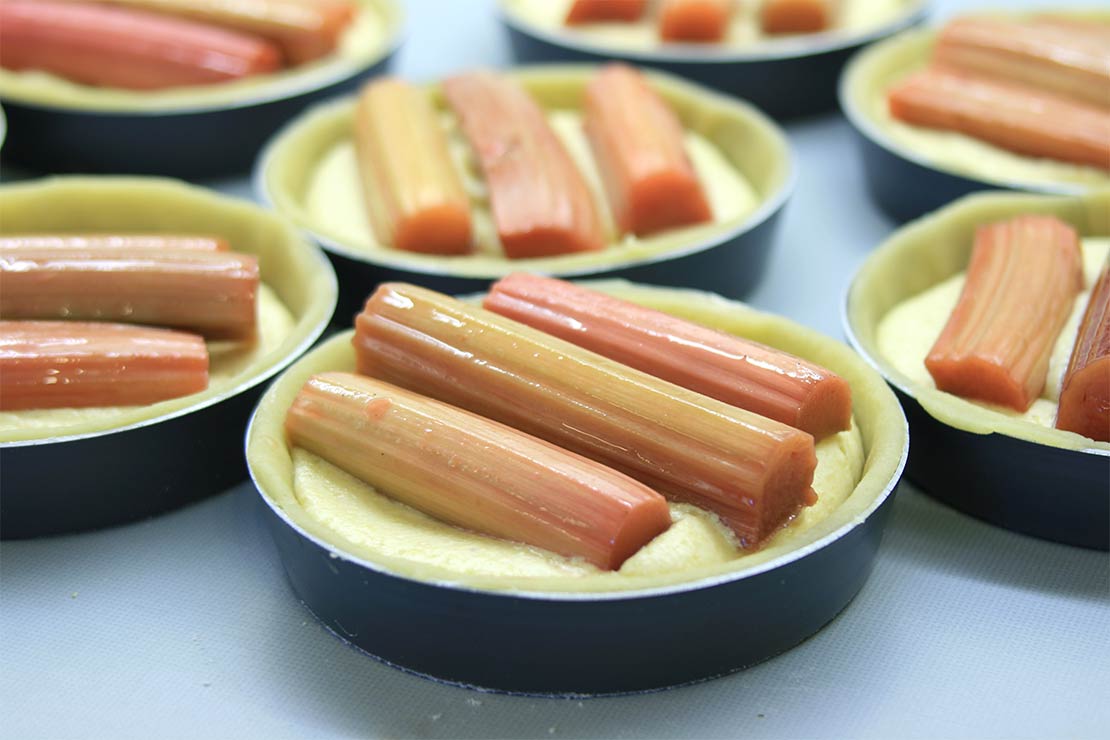 the rhubarb sticks on top of the tart