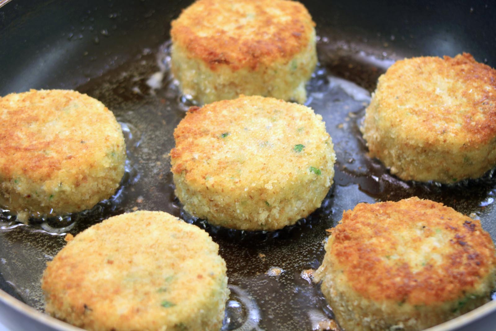 frying the fish cakes