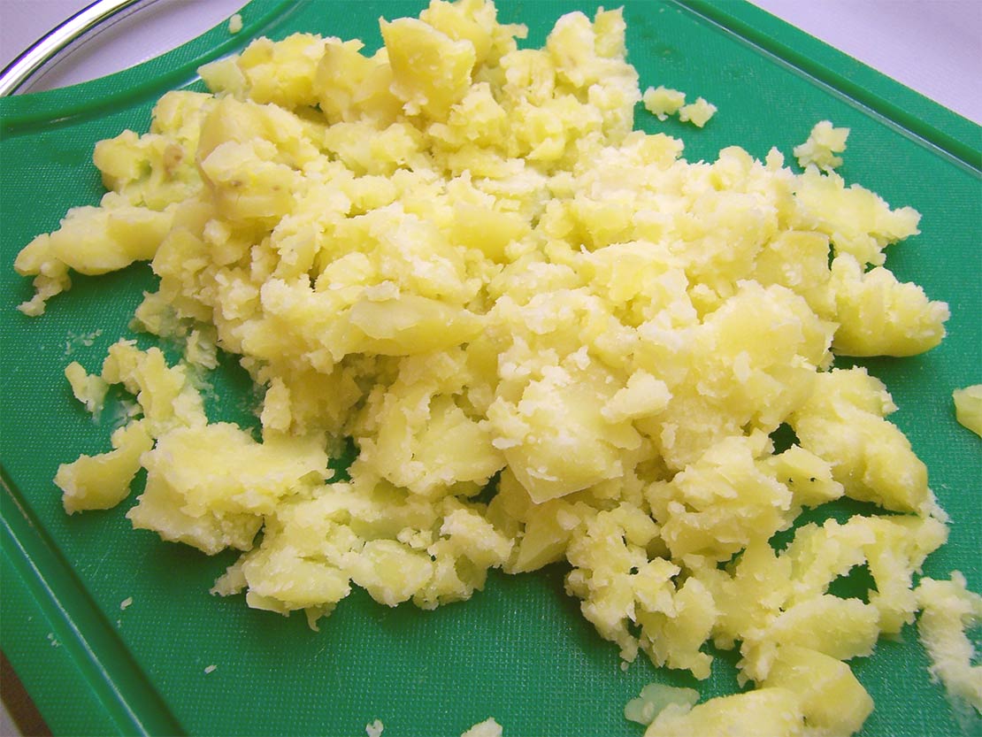 chrushing the potatoes