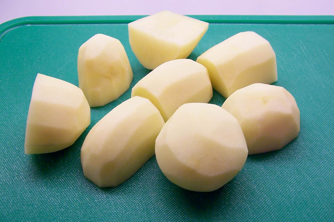 cut, raw roast potatoes