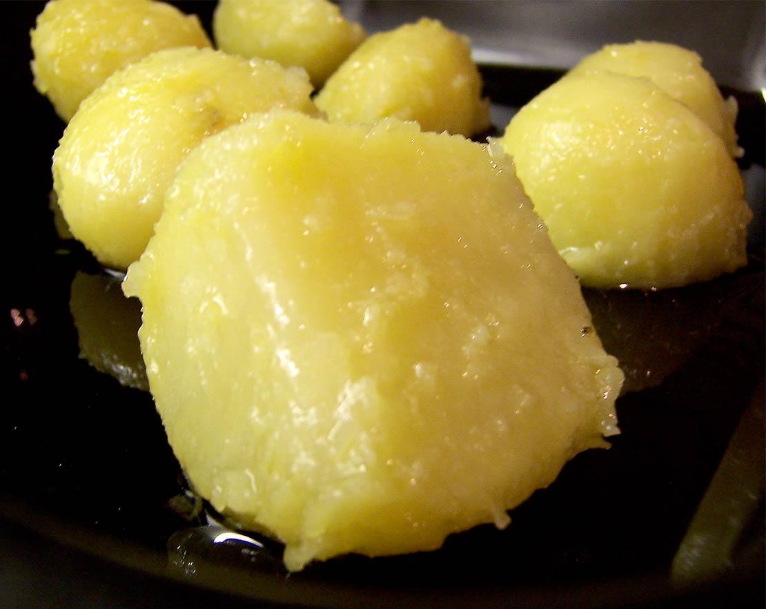coating the potatoes