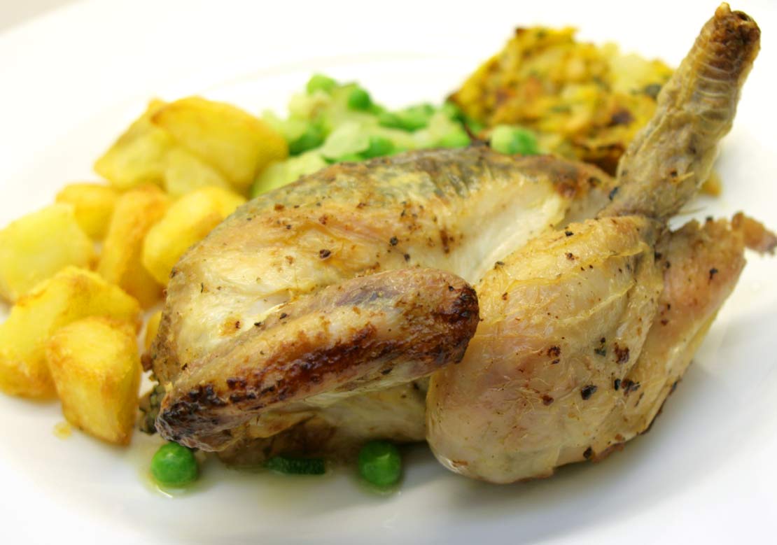 the finished herb roasted poussin
