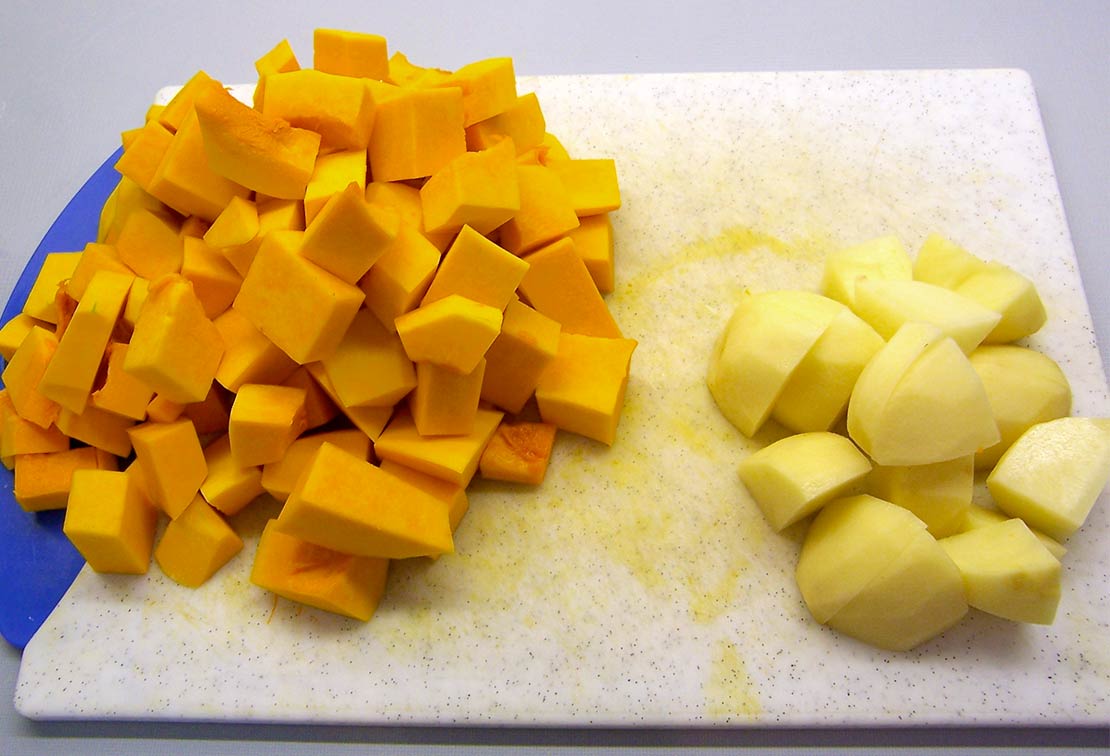 Chopping the potato and pumpkin
