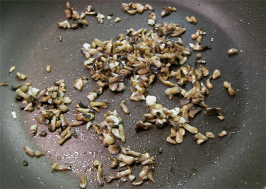 frying the mushroom and garlic