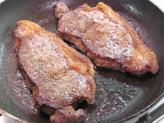 frying the steak