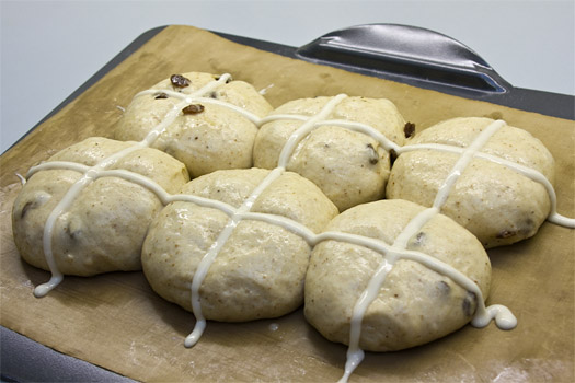 the hot cross buns ready for the oven