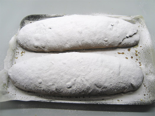 the stollen dredged with icing sugar