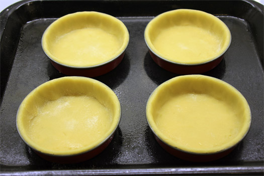 the pastry lined tart tins