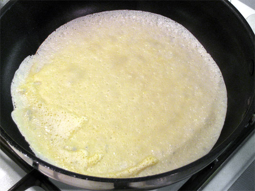 cooking the first side of the pancake