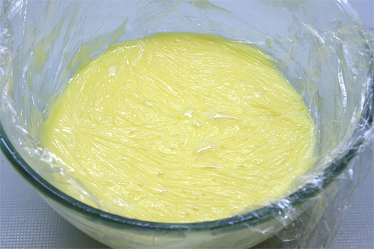 covering the lemon curd with cling-film