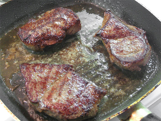 frying the steaks