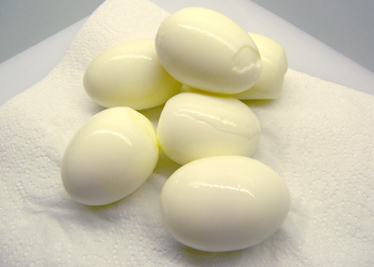 peeled, hard-boiled eggs