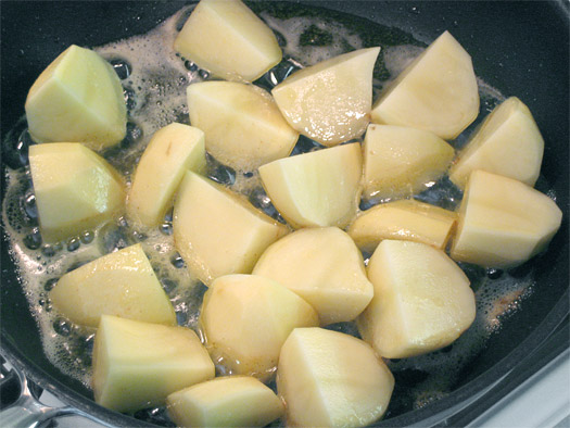 the potatoes in the pan