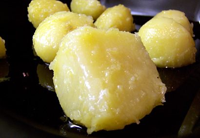 coating the potatoes