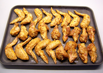 the wings on a baking tray