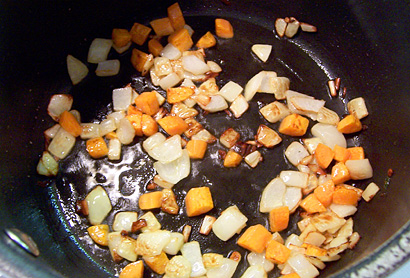 frying the onion and carrot