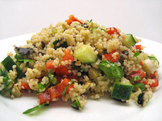 an unctuous pile of the finished couscous salad on a plate
